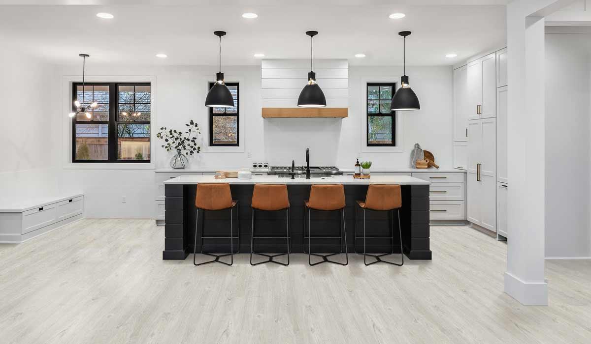 light wood-look laminate flooring in a kitchen