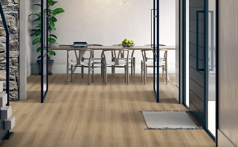 warm toned laminate flooring in entryway